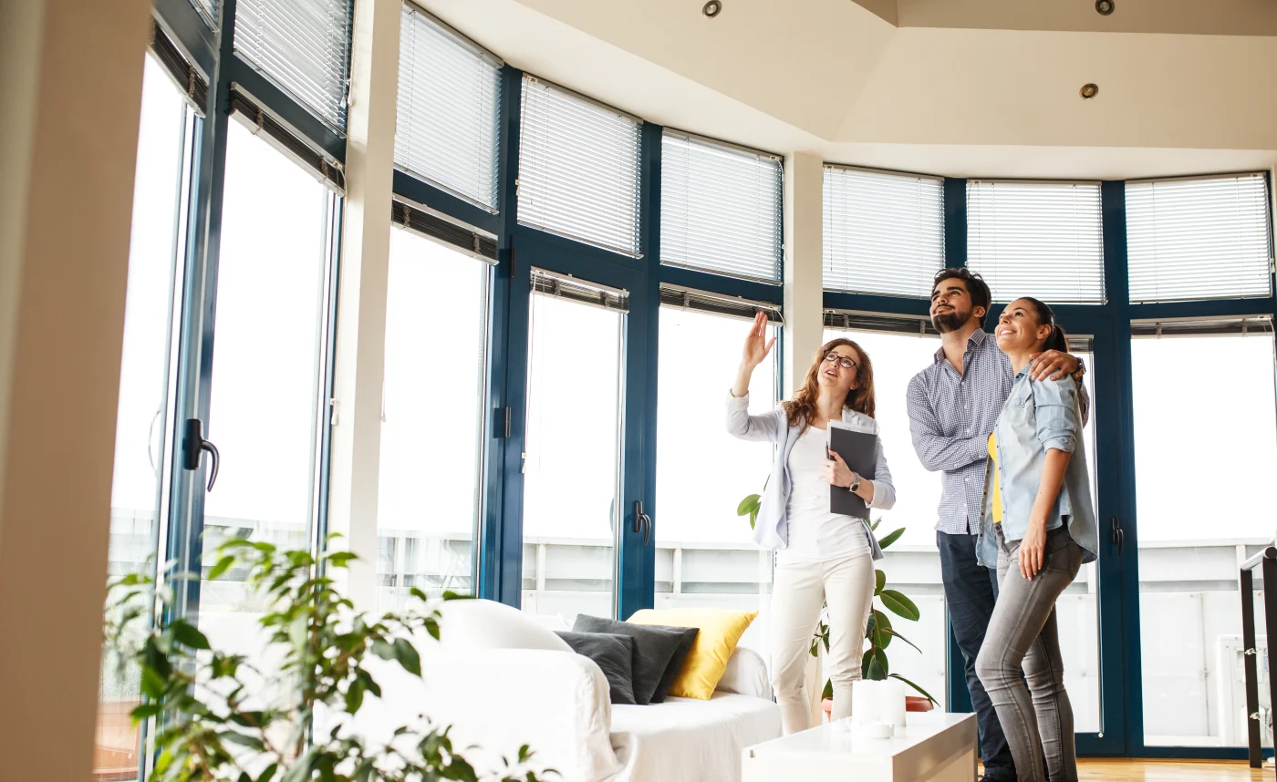 A representative shows San Francisco Bay area homeowners window shading solutions