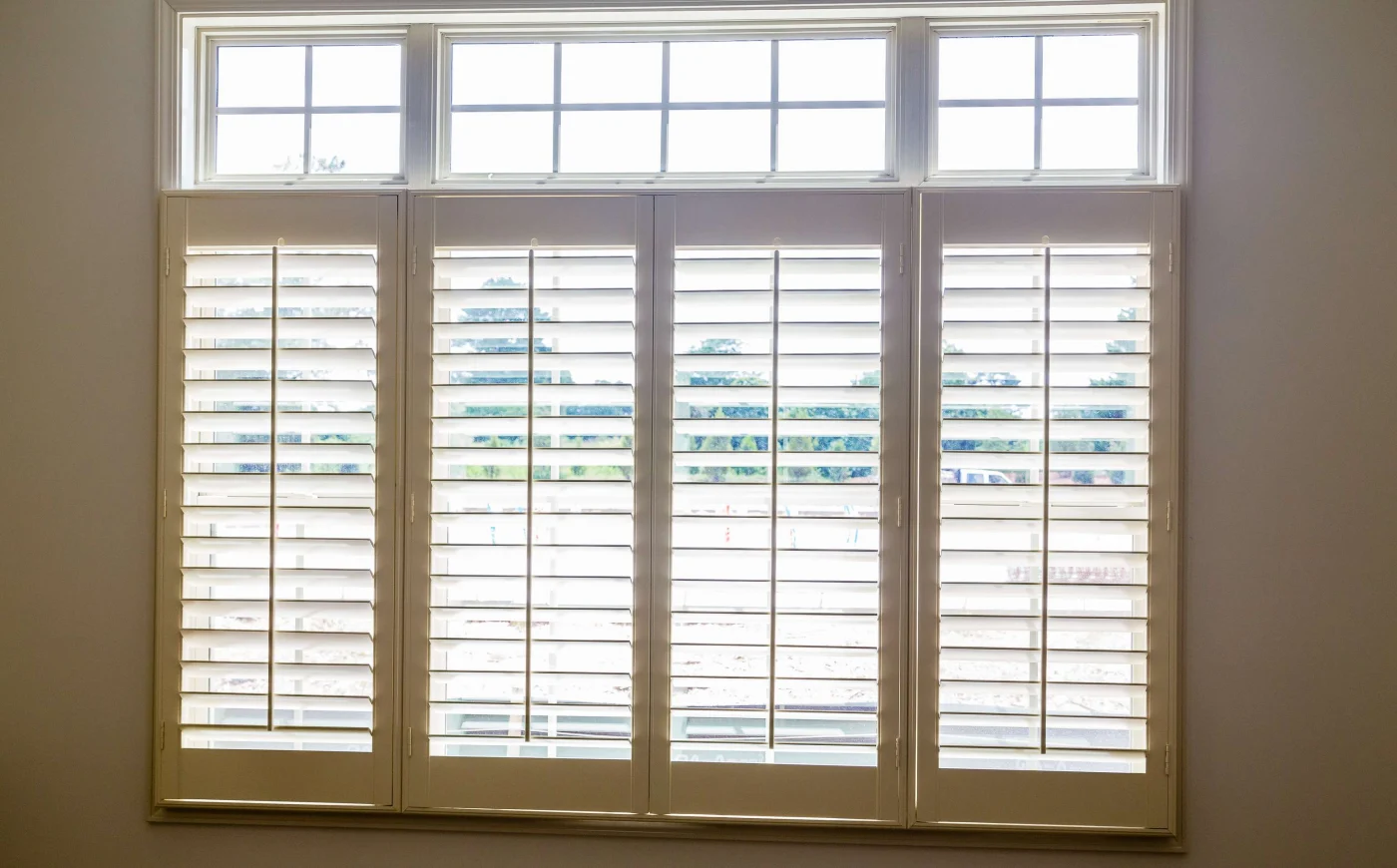 Wood plantation shutters in the interior of St. Helena, CA home by The Home Living Company