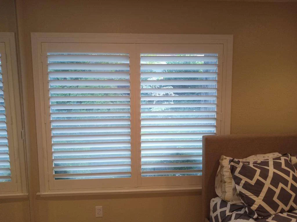 Exquisite Window Coverings In Sausalito, CA | Home Living Window Fashions White custom shutters over windows to create more privacy in room in Sausalito, CA | The Home Living Window Fashion