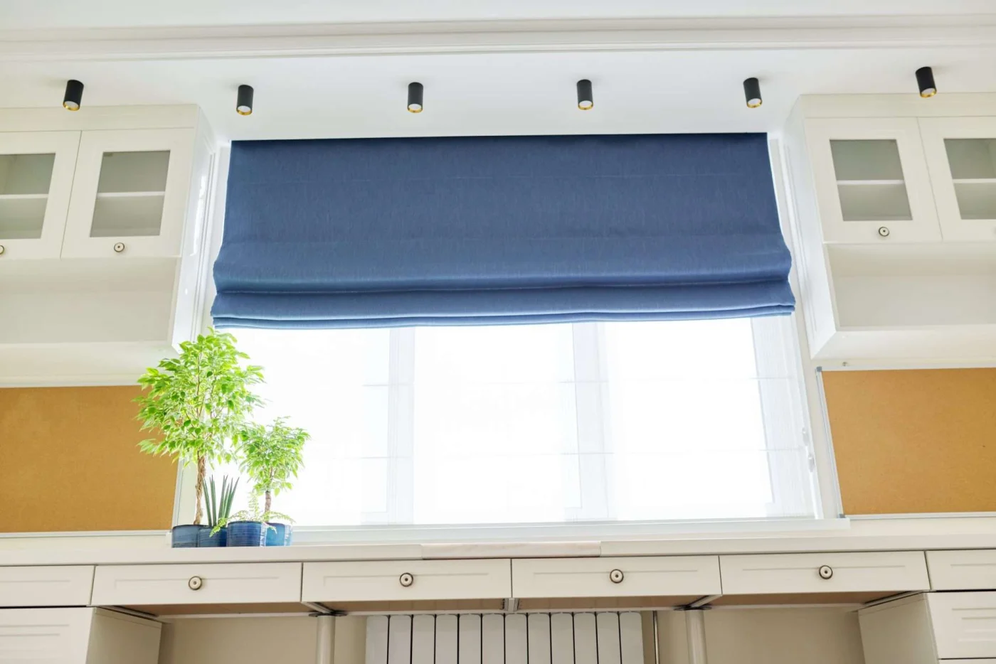 Roman Blind In The Interior Detail Close Up Beautiful blue shade on window inside home