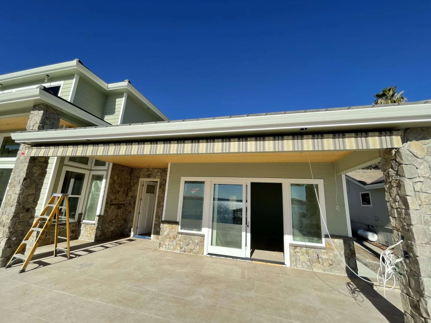 Gorgeous Retractable Awnings San Mateo Ca Home Living Window Fashions Home with new retractable awning with screen installed near back patio doors
