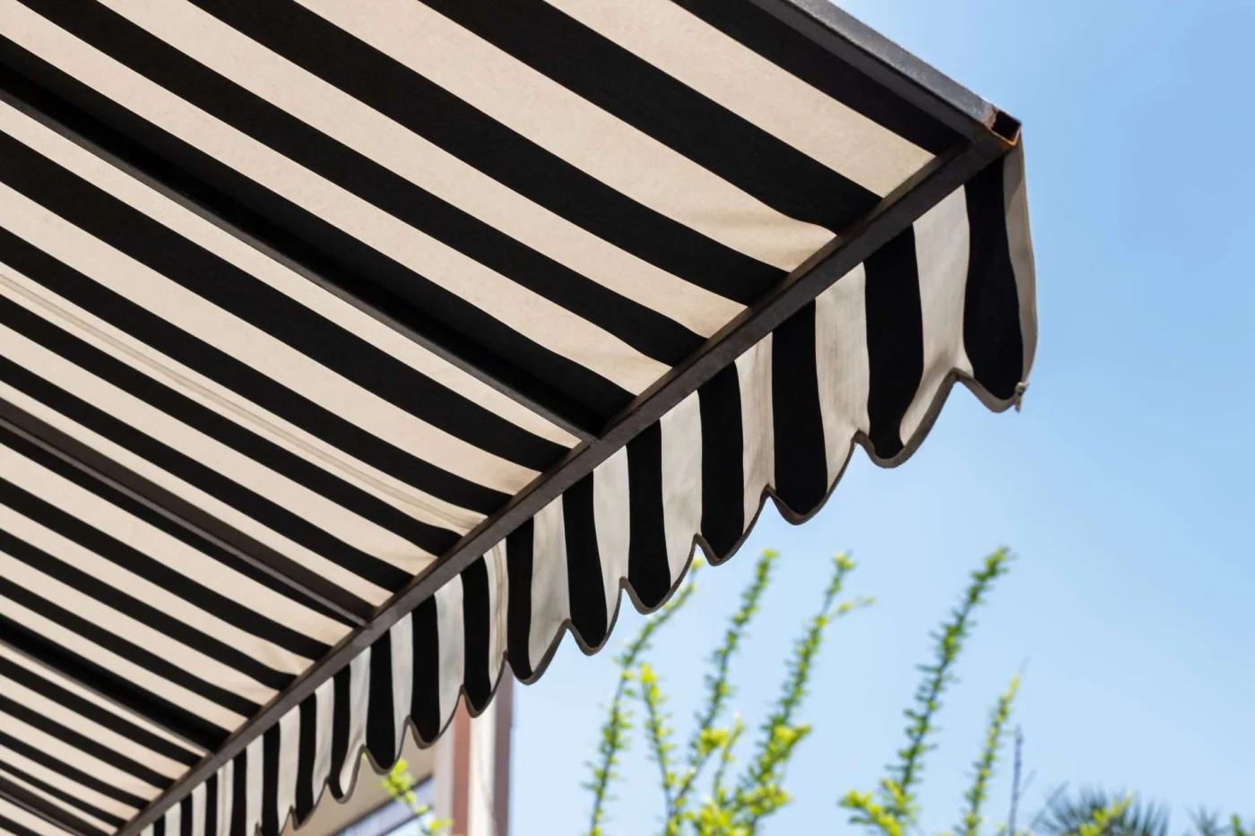 Black and white striped awning in San Pablo, CA by The Home Living Company