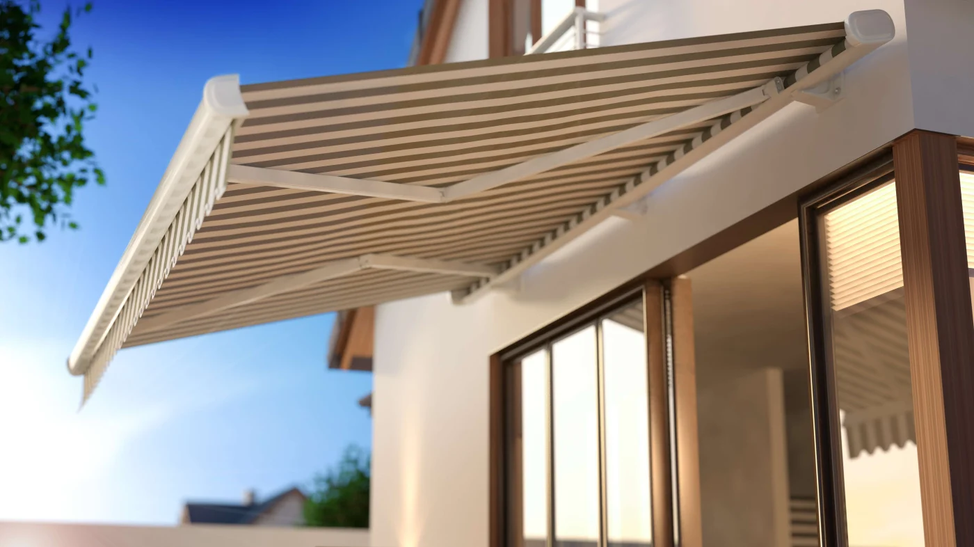Retractable awning with striped fabric over the patio in St. Helena, CA | The Home Living Company