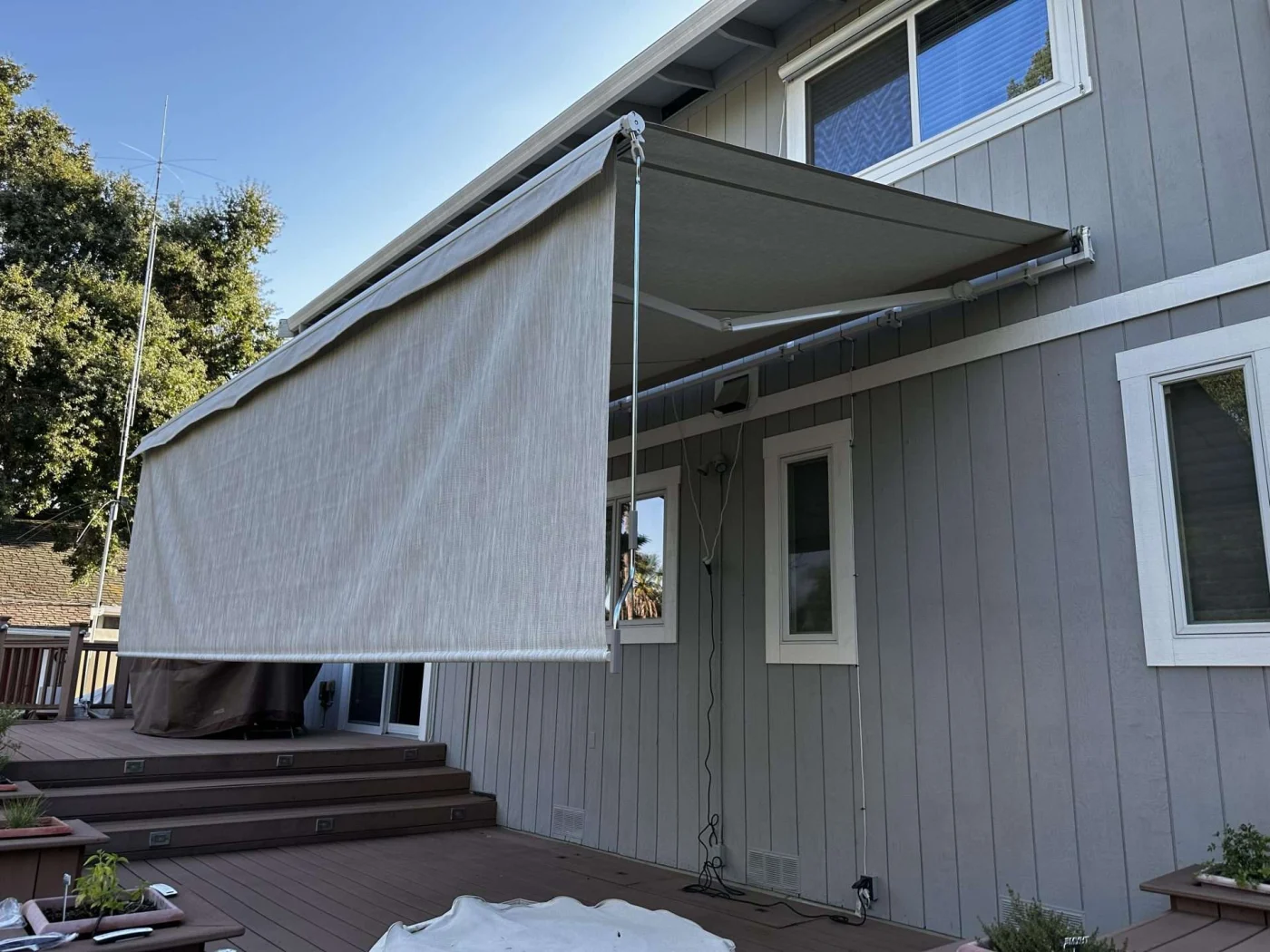 Home with outdoor retractable awning installed in Sausalito, CA | Home Living Window Fashions