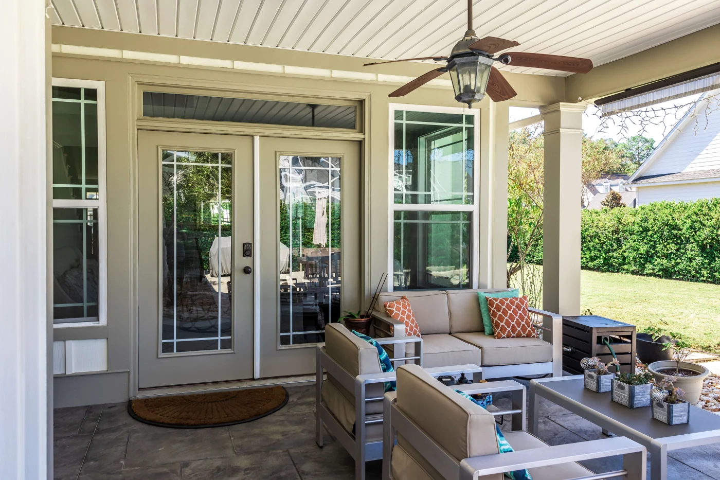 Patio behind lifted motion screens at St. Helena, CA home | The Home Living Company