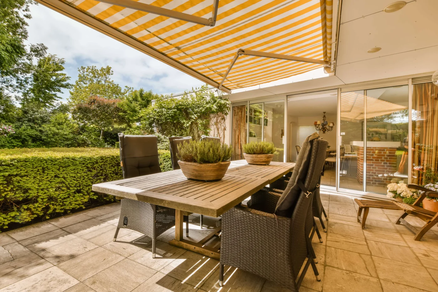 Gorgeous Awnings | San Rafael, CA | Home Living Window Fashions Cozy dining area on a patio covered by an awning